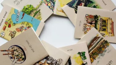 Collection of Vietnam travel journals featuring watercolor illustrations of Hoi An and Pho.