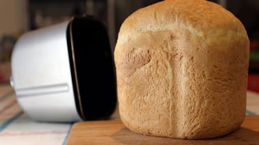 a loafed loafed bread on a cutting board