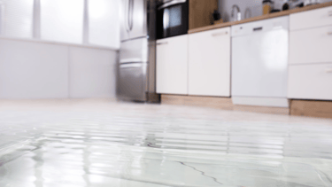 a kitchen floor with a glass flooring and a glass floor