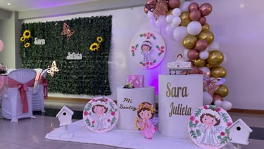 a table with a bunch of balloons and balloons