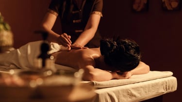 Woman getting a back massage at Statera Vitae Medspa.