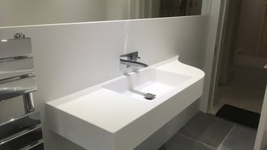 Bathroom sink with bespoke shape