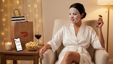 a woman with a skincare mask on her face