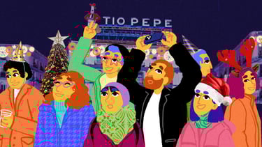 a group of people looks up and takes photos and smiles in the plaza del sol of Madrid