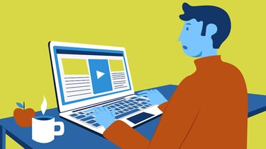 a man sitting at a desk with a laptop looking surprised