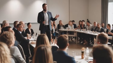 An open laptop with documents and a coffee cup on a desk.