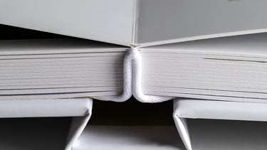 a book opened to show a book with a picture of a book open to show