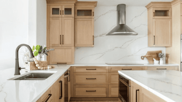 natural unfinished cabinets with quartz backsplash