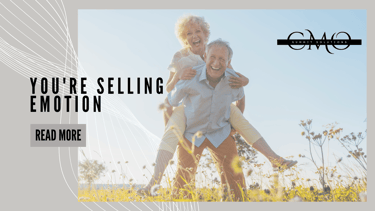 you're selling emotion a man carrying a woman piggyback through a field smiling