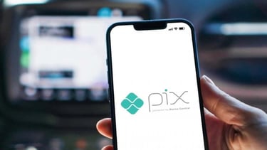 a person holding a phone with a phone in their hand