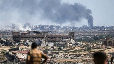 a group of people standing in front of a building