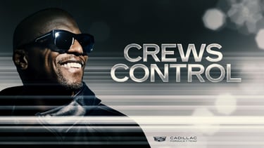 Terry Crews smiling in sunglasses for the Cadillac Formula 1 Team advertisement titled Crews Control.