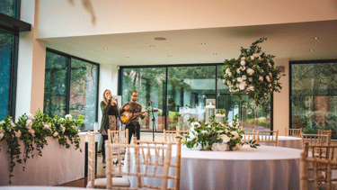 musicians singing in wedding venue