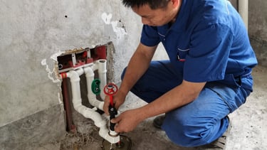 A social media manager working on a laptop with vibrant screens showing analytics and posts