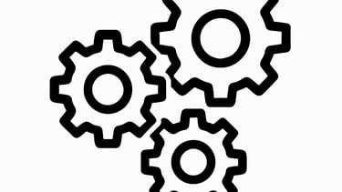 Icon of interlocking gears symbolizing system integration.