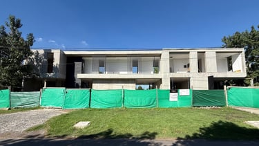 a house with a fenced in area with a fenced in area with a