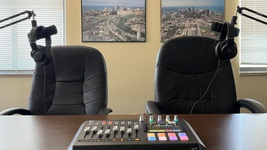 Riggs Audio mobile podcast production setup with microphone and headphones