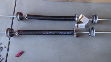 Garage door torsion spring set-up.