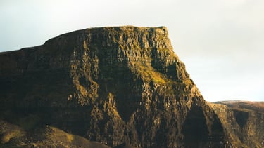 a mountain side view of a mountain in Isle of Skye