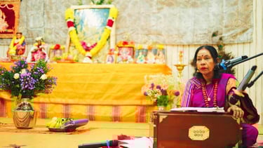 mataji laxmi teaching on stage
