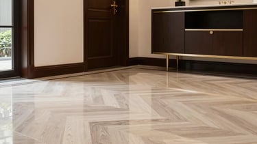 Close-up of a polished commercial floor gleaming under soft blue lighting.
