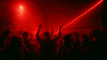 Gritty Chicago after-hours loft party, raw brick walls, single red strobe light, dancers in deep shadow