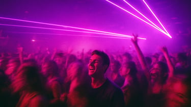 Motion-blurred crowd on a packed outdoor deck at night, neon purple strobes, 35mm film grain