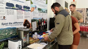 Visitors lining up at the buffet table 
