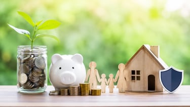 Emergency fund concept with savings jar, piggy bank, family figures, and house model