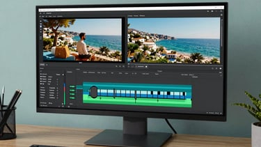 A creative workspace setup with a 4K monitor displaying a video editing timeline of a lifestyle promo. Modern aesthetic with muted teal tones. Turkish / Aegean Coast.