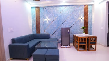 a living room with a couch and a table