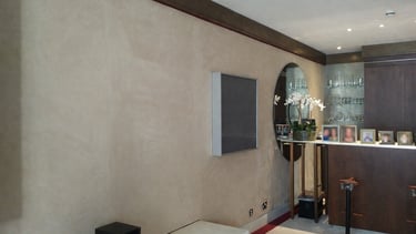 Neutral fabric wall finish in a residential living room