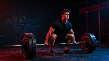 Low-angle heroic shot of an athlete performing a heavy deadlift, intense focus, high-contrast shadows, red and blue neon accents