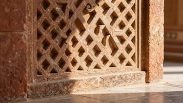 Close-up of a hand-carved Rajasthani stone screen, warm sunlight streaming through the geometric patterns, casting soft shadows on a polished floor.