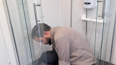 man fixing the shawer