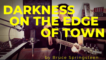 Guitar teacher performing 'Darkness On The Edge Of Town' by Bruce Springsteen in home studio