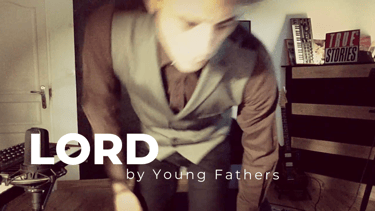 Guitar teacher performing 'Lord' by Young Fathers in home studio