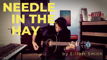 Guitar teacher performing 'Needle in the hay' by Elliott Smith in home studio
