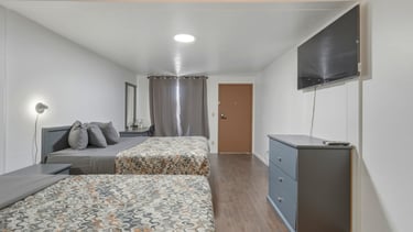 Patriot stay Motel Vernal Ut. Room with tow queen beds, large tv, hotel and motel furniture vernal