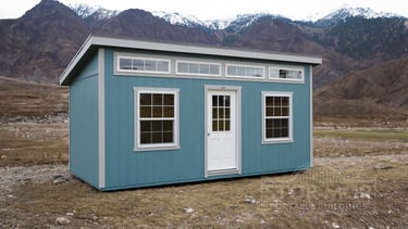 Modern blue shed studio with transom windows - Backyard office shed