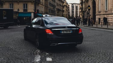 a car driving down a street with a lot of traffic