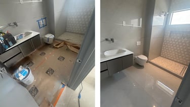 a bathroom with a toilet and a sink
