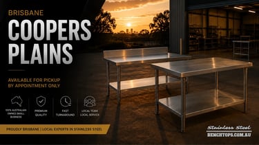 Heavy-duty stainless steel bench Coopers Plains displayed outdoors at sunset.