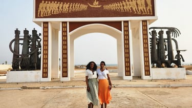 Tourists visiting Slave Door of No Return in Benin