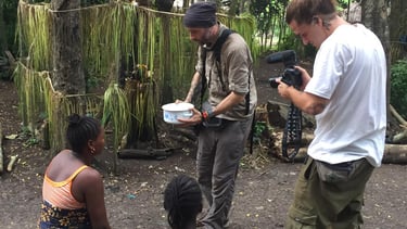 Tourists making video in the remote village in Photography Tours in Benin