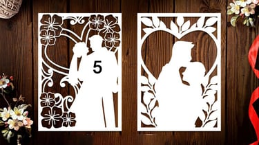 a couple of paper cutouts of a wedding couple