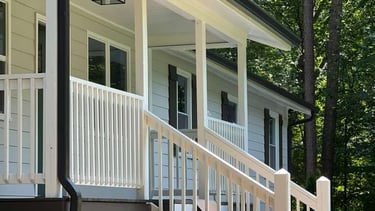 Professional seamless aluminum gutter installation.