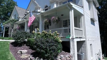 Professional seamless aluminum gutter installation.