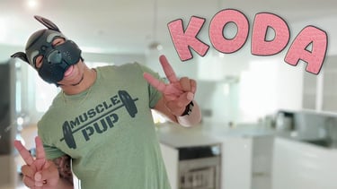 A man poses in a pup mask - KODA