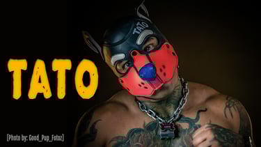 A man in his pup mask. "TATO"